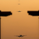 A photo of planes lining up to land at Heathrow Airport in the UK.
